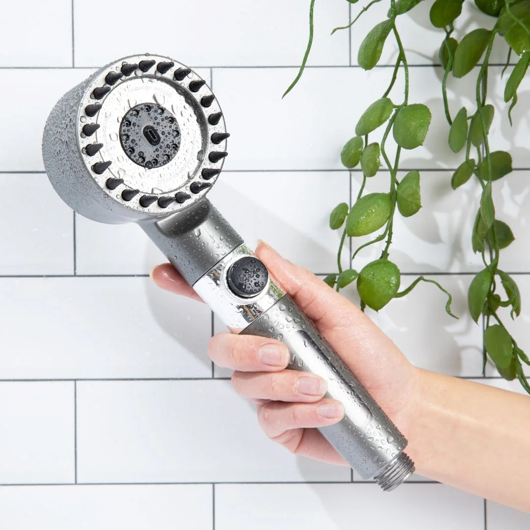 FlowMist filtered showerhead with a sleek design, offering high-pressure water flow and advanced filtration technology, enhancing skin hydration and hair health.